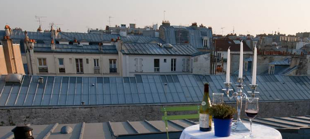 Table étoilée sur les toits de Paris